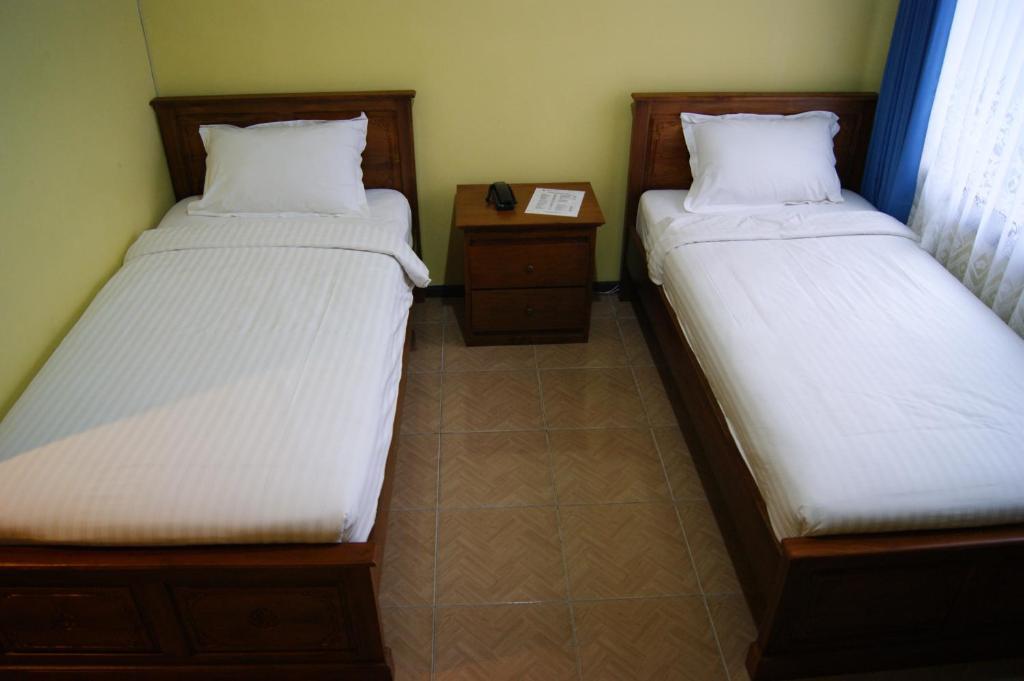 Grand Sumatera Hotel スラバヤ 部屋 写真
