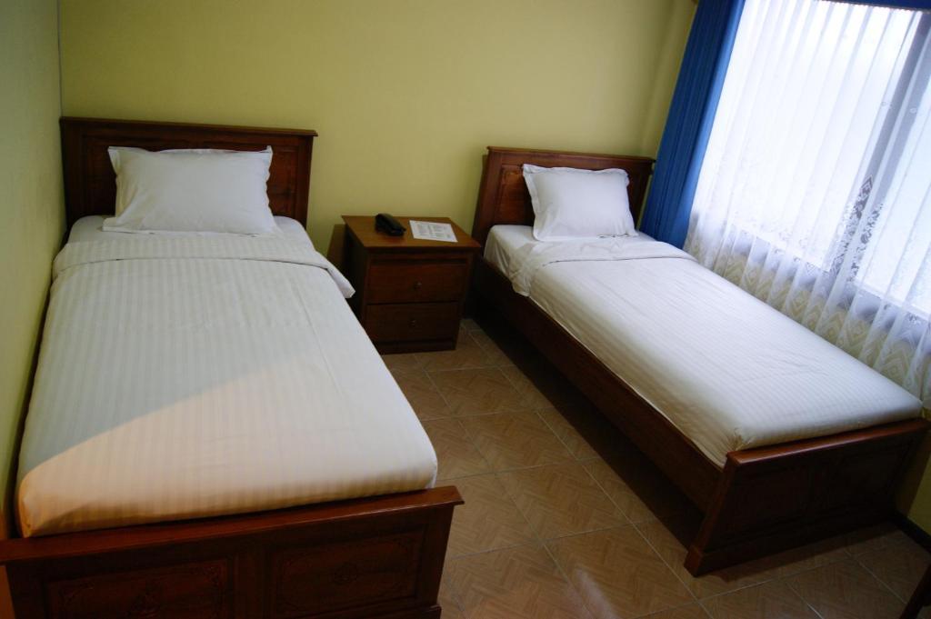 Grand Sumatera Hotel スラバヤ 部屋 写真