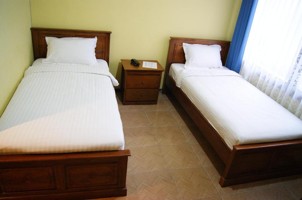 Grand Sumatera Hotel スラバヤ 部屋 写真